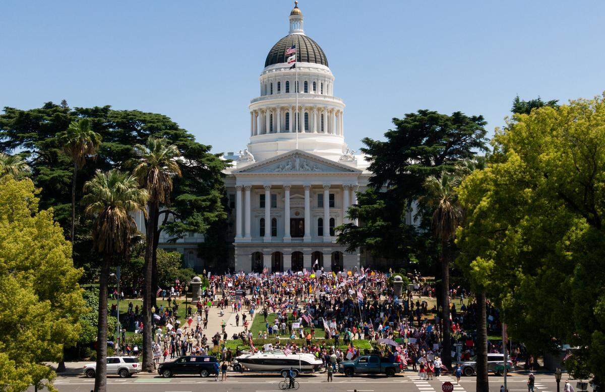 People protest Gov. Gavins Newsoms stay-at-home order and support various other political causes, seen in a drone photo at the California Capitol, on Friday, May 1, 2020, in Sacramento.