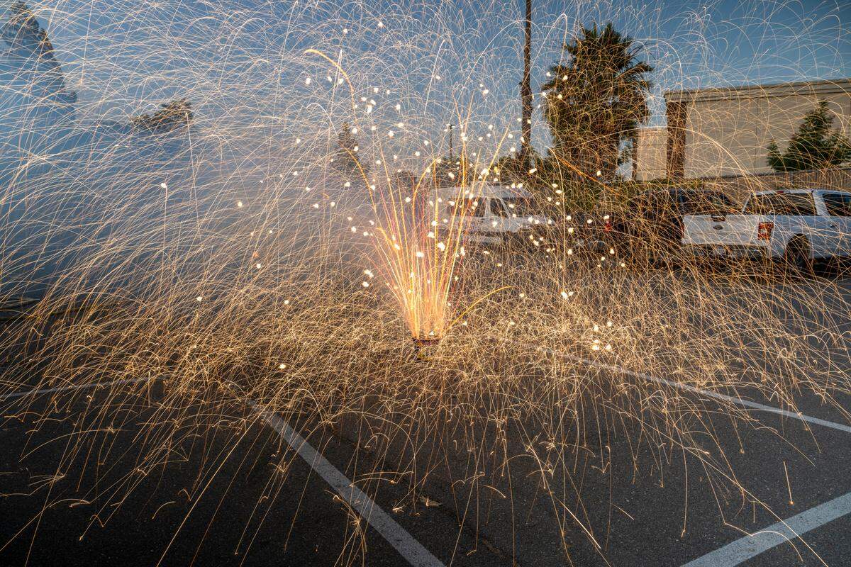 TNT Fireworks’ Opening Show box spins in the parking lot of Sacramento Fire Department Station 19 on Thursday, June 19. One intern praised the “stupendously big boom.”