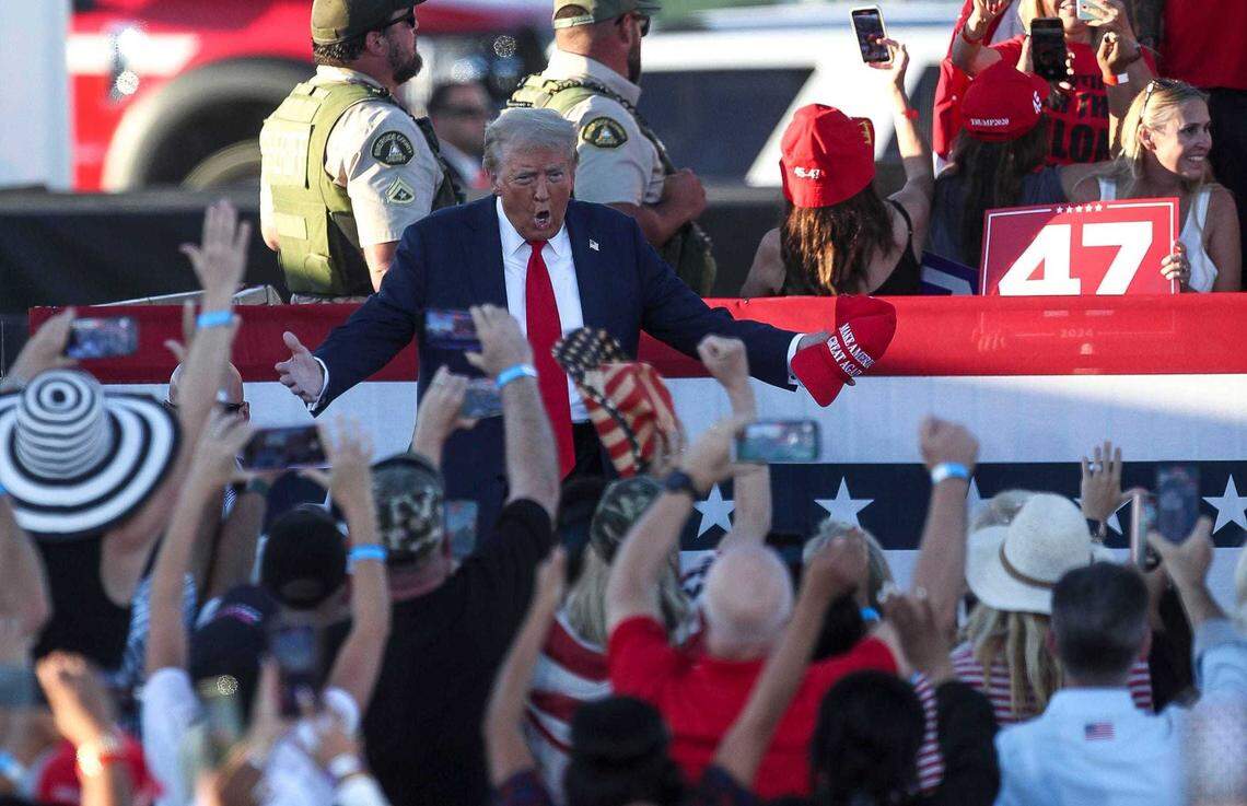 Donald Trump takes the stage during a campaign rally on Oct. 12 in Coachella. At the event, he attacked Sen. Adam Schiff as a “scam artist” and renewed false claims of mortgage fraud.