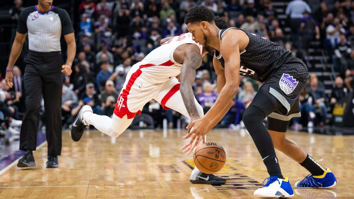 Sacramento Kings guard/forward PJ Dozier (35) steals the ball from Houston Rockets forward Tari Eason (17) during the fourth quarter of the NBA basketball game Wednesday, Jan. 11, 2023, at Golden 1 Center in Sacramento. The Kings beat the Rockets, 135-115.