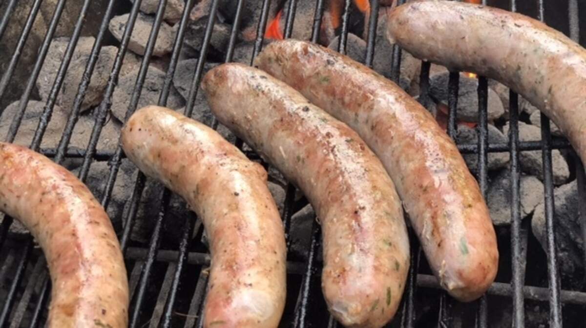 Good grilling advice: Keep the fire on one side of the grill so you can prevent sausages from splitting open.