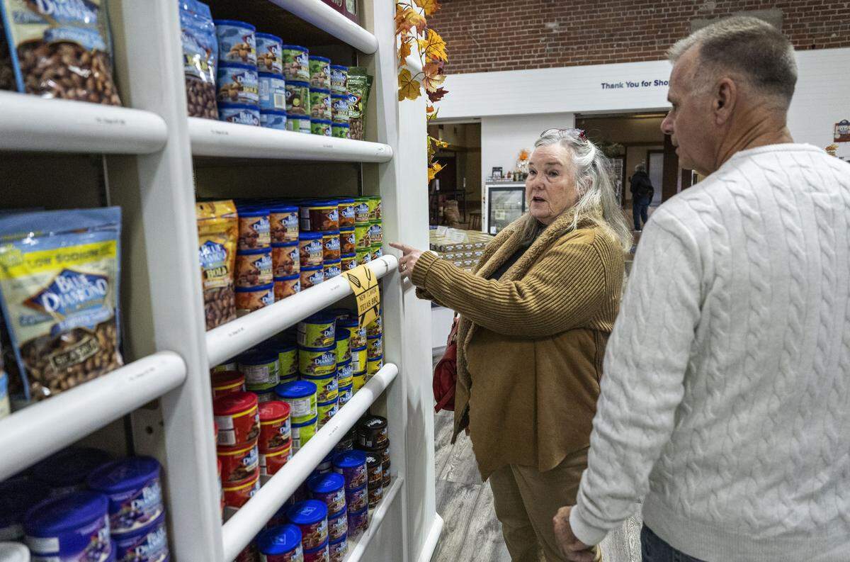 Liz Janowitz, of Roseville, shops for Christmas gifts for her customers on the East Coast at the Blue Diamond Nut & Gift Shop on Wednesday. “It’s a tradition for us. We come every year around Christmas and we buy tons of different almonds and we send them back east to our business that we’re involved in. It’s sad that it’s not gonna be here because now we’re going to have to go to Turlock or Salida or Modesto,” said Janowitz.