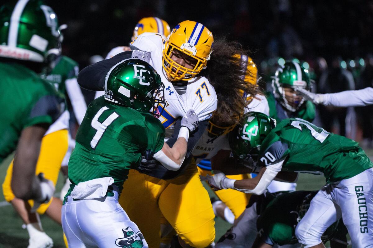 Grant Pacers offensive lineman Alani Noa (77) blocks the El Cerrito Gauchos’ Andrew Nicholds (4) during the fourth quarter of the CIF Division III-AA Northern California Regional Championship football game Friday, Dec. 2, 2022, at El Cerrito High School. The Pacers won 36-7.