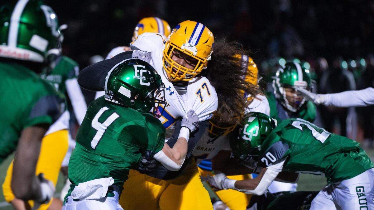 Grant Pacers offensive lineman Alani Noa (77) blocks the El Cerrito Gauchos’ Andrew Nicholds (4) during the fourth quarter of the CIF Division III-AA Northern California Regional Championship football game Friday, Dec. 2, 2022, at El Cerrito High School. The Pacers won 36-7.