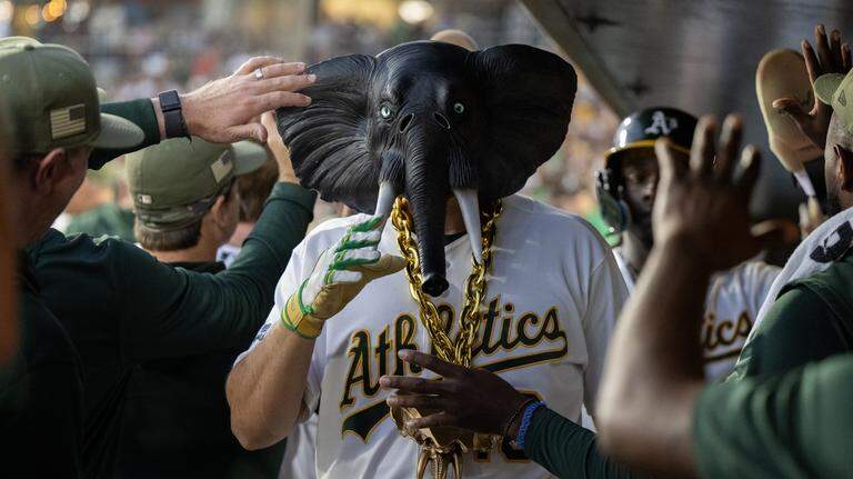 Photos: Athletics get the big hit to power past Giants