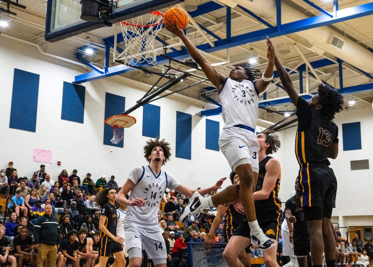 Inderkum Tigers guard Siincere Hudson (3) scores with a layup against Oakland Tech in a CIF Northern California Division I quarterfinal in Sacramento in March.