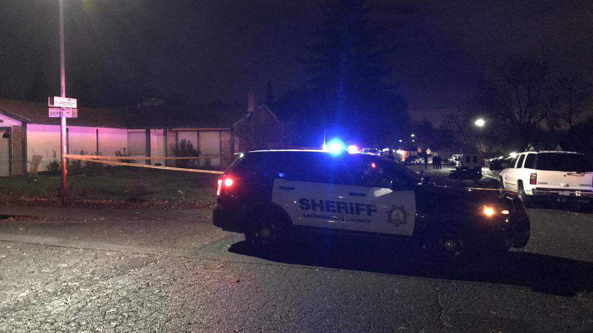 The scene at the 7100 block of Flanders Way in north Sacramento, where one victim was killed and another injured in an apparent shooting.
