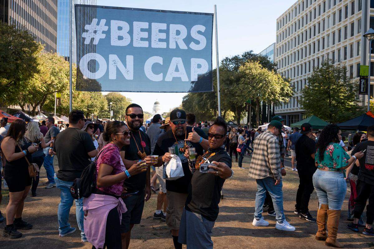 Kristin Crenshaw, Sean Martinez, Damon Evans and Ronald Cabalbag take a selfie while enjoying beer samples at the Capitol Beer Fest on Saturday. The Sacramento region is bursting with top-rated flavorful stouts worth trying.