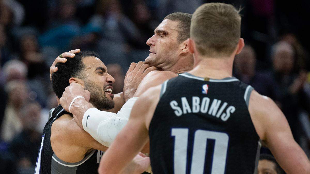 Sacramento Kings forward Trey Lyles (41) and Milwaukee Bucks center Brook Lopez (11) fight during the final seconds in the fourth quarter during a game at the Golden 1 Center in Sacramento, Monday, March 13, 2023. They were both ejected from the game,