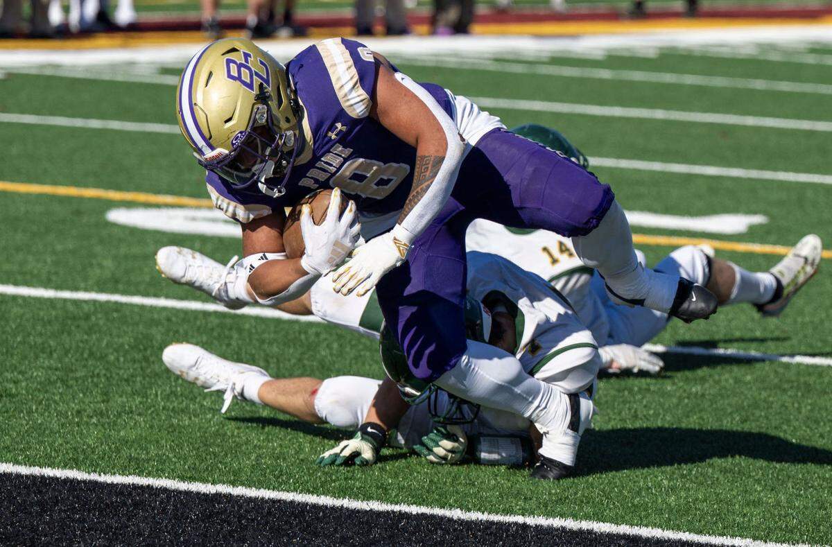 The Bradshaw Christian Pride’s Mateo Mojica scores his team’s first touchdown against the Sonora Wildcats in the Sac-Joaquin Section Division VI championship game in November. Mojica is The Bee’s Smallest School Player of the Year.