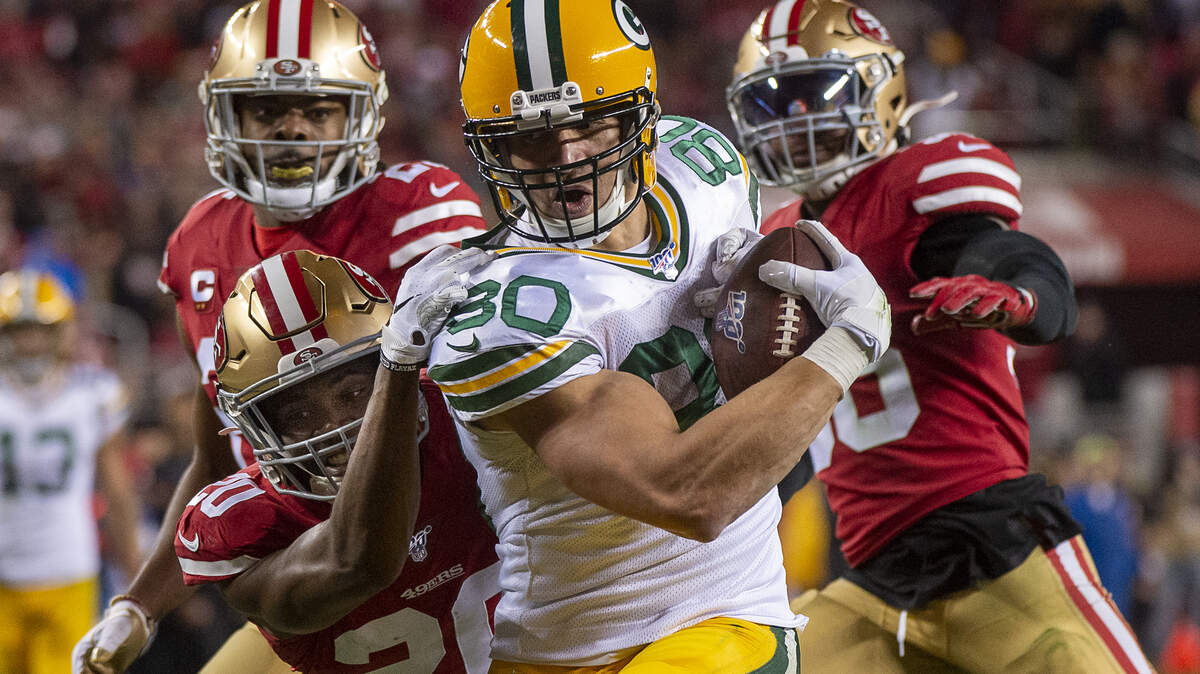 San Francisco 49ers free safety Jimmie Ward (20) tackles Green Bay Packers tight end Jimmy Graham (80) short of a touchdown in the fourth quarter during the NFC Championship at Levi’s Stadium on Sunday, Jan 19, 2020 in Santa Clara.
