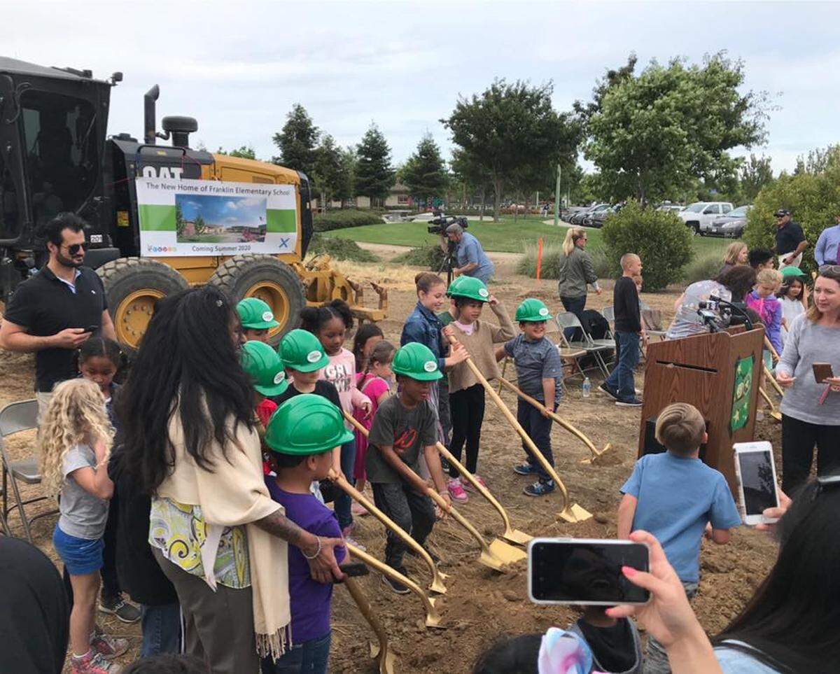 Students at Franklin Elementary School in Elk Grove wield their shovels at a groundbreaking ceremony Tuesday for a new campus at Dorcey and Gilliam drives. 