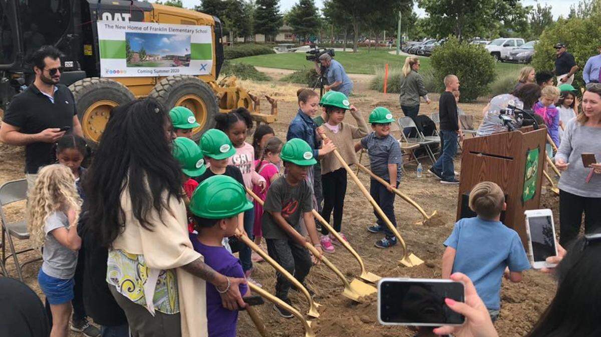 Students at Franklin Elementary School in Elk Grove wield their shovels at a groundbreaking ceremony Tuesday for a new campus at Dorcey and Gilliam drives. The site is scheduled to open in fall 2020.