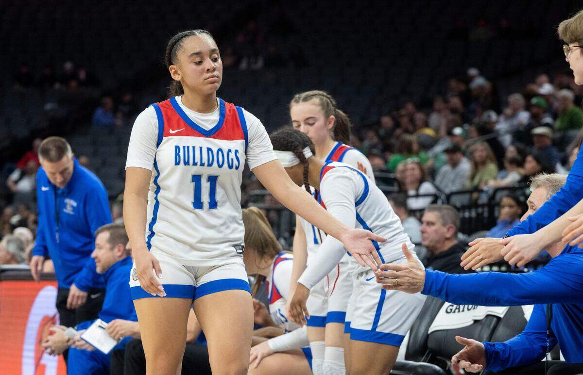 Folsom High School’s Aryn Bright (11) returns to the bench as the team loses to St. Mary’s of Stockton during the CIF Sac-Joaquin Section Division I girls basketball championship game on Wednesday, Feb. 21, 2024, at Golden 1 Center.