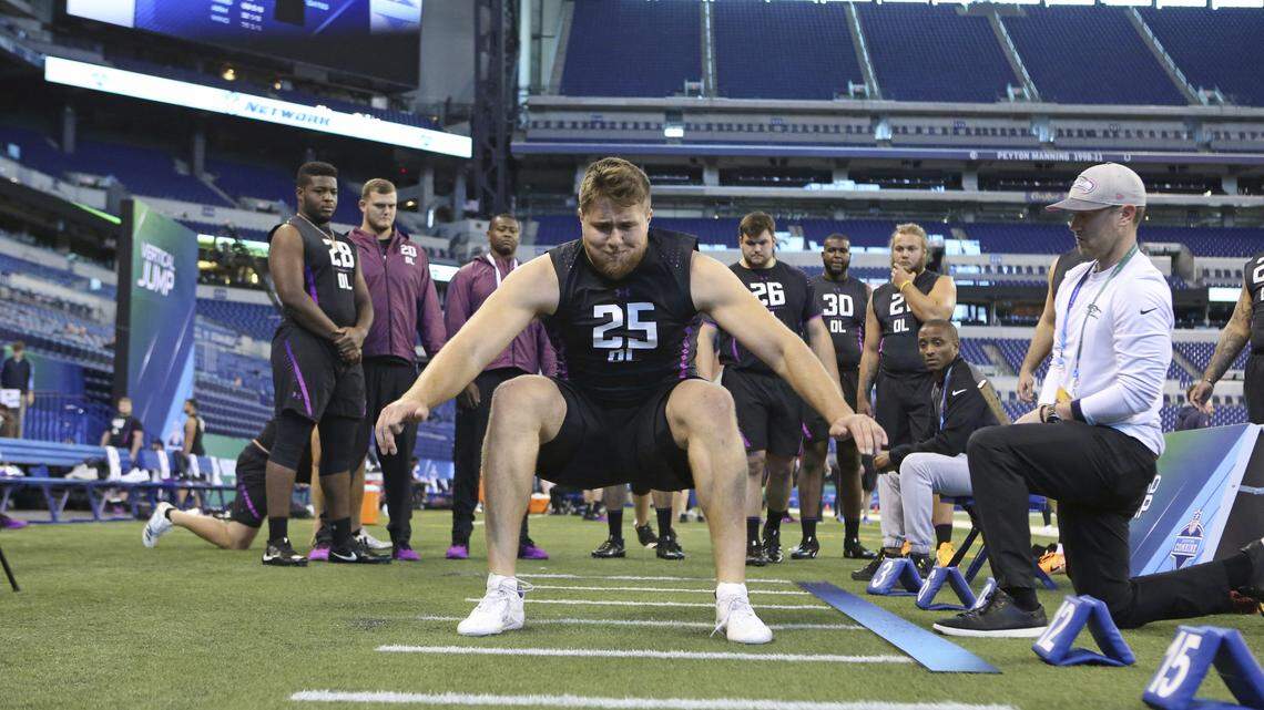 UCLA offensive lineman Kolton Miller participates in the broad jump at the 2018 NFL Scouting Combine on Friday, March 2, 2018, in Indianapolis.