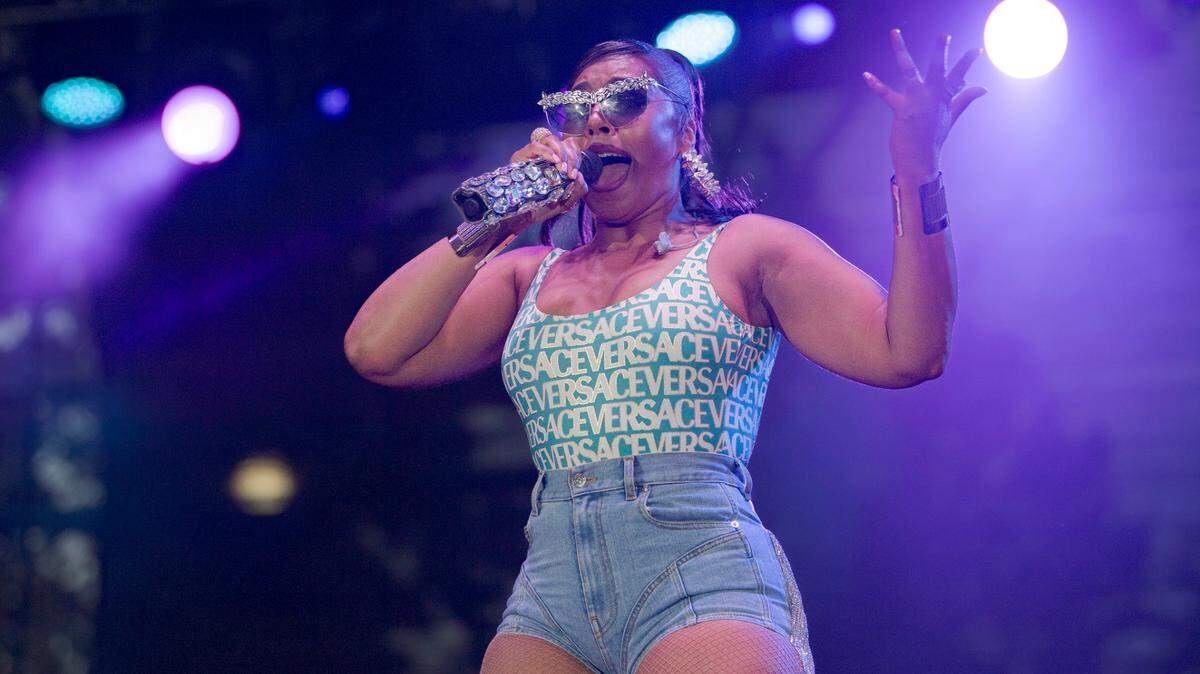 Singer Ashanti holds a crystal-studded microphone while performing on the Golden 1 Stage inside the California State Fair on Wednesday night as part of the Toyota Concert Series. The series continues with Gin Blossoms on Friday and Kool & The Gang on Saturday night.