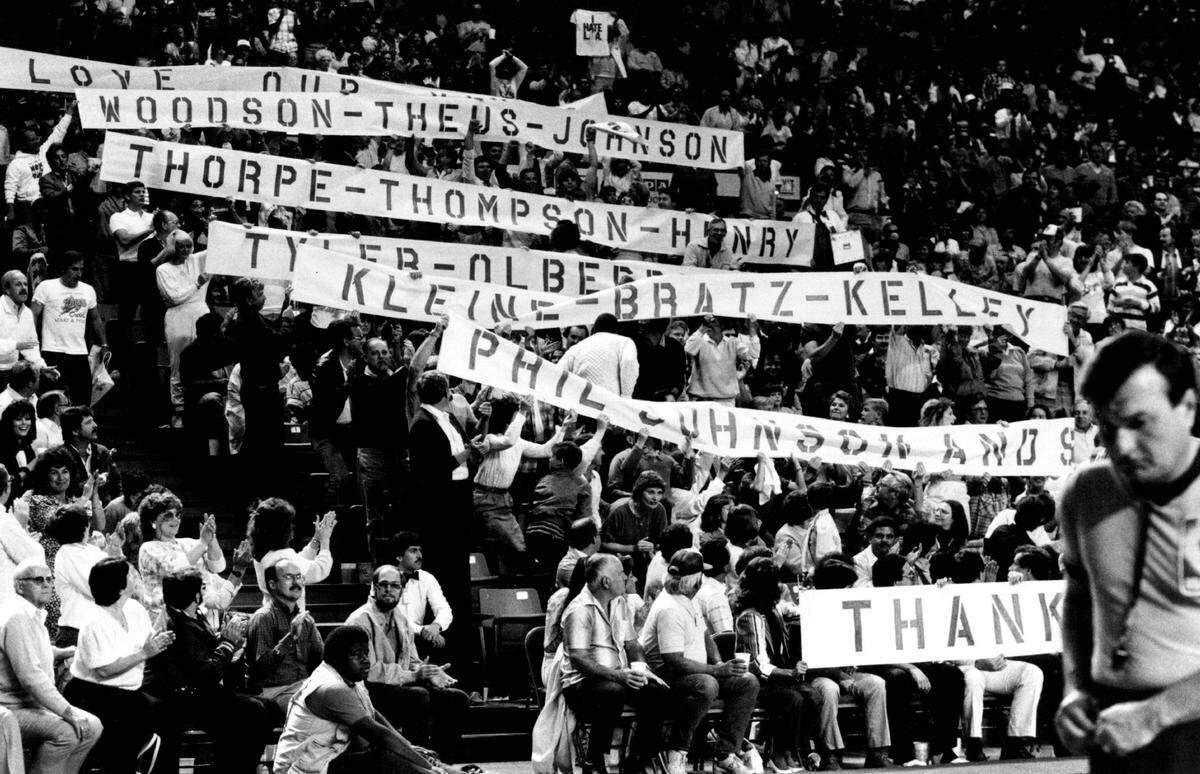 Sacramento Kings fans celebrate their team at Arco Arena during the final game of their first regular season in the city on April 12, 1986. 