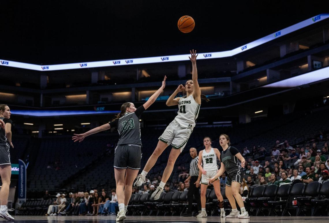 Colfax Falcons guard Madalyn Sigrist (11) shoots against the Ponderosa Bruins’ Rowan Thomas (23) during the 2025 CIF Sac-Joaquin Section Division III girls basketball championship game at Golden 1 Center.