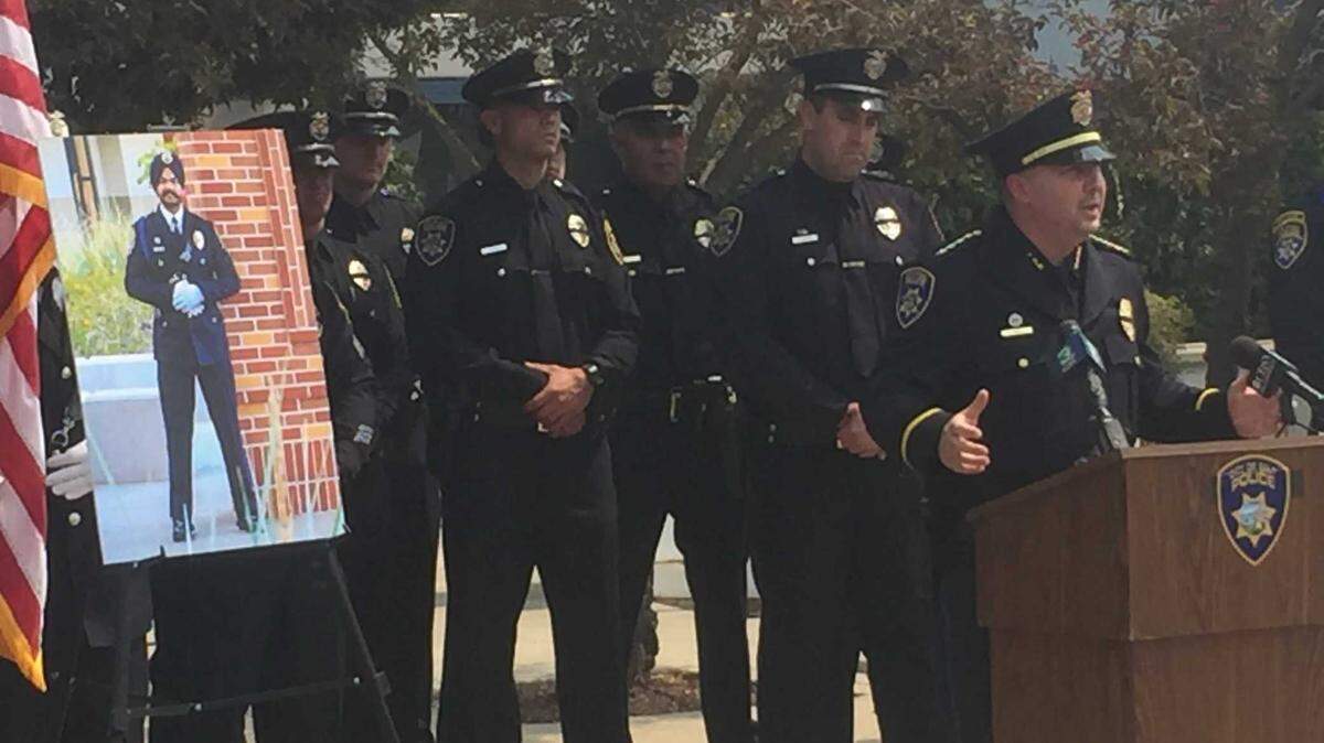 Galt Police Department interim Chief Rick Small announces the death of Officer Harminder Grewal outside police headquarters Friday, Aug. 27, 2021, in Galt, Calif. Grewal died late Thursday of injuries suffered in a collision Aug. 22 on Highway 99 near Dillard Road as he and his partner traveled to assist with the Caldor Fire in El Dorado County.