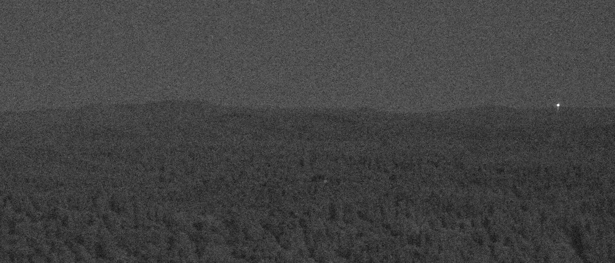 An image captured by the AlertWildfire camera atop Howell Mountain in Placer County showed one light in the distance as PG&E’s engineered blackout began Wednesday, Oct. 9, 2019.