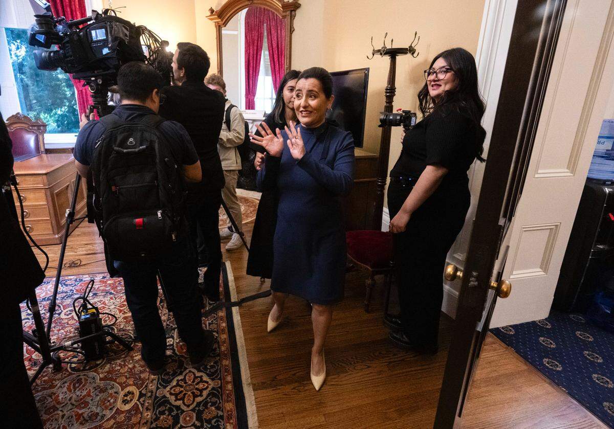 Senate President pro tem Monique Limón, D-Goleta, leaves her office after speaking to members of the press on Monday, shortly before she was officially sworn into her new role. 