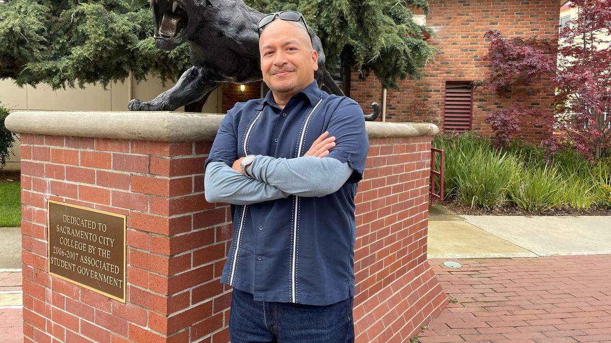Mauricio Gonzalez stands in front of Sacramento City College’s panther statue on April 5, 2024. Gonzalez is one of three Latino counselor at Sacramento City College, which is deemed a Hispanic Serving Institution. The student to counselor ratio is 1 to 900.