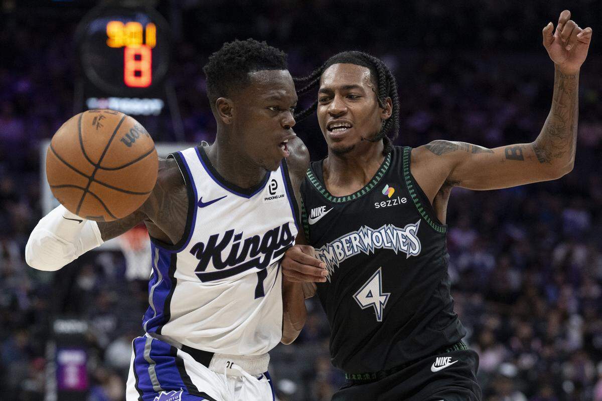Minnesota Timberwolves guard Rob Dillingham (4) defends Sacramento Kings guard Dennis Schroder (17) during a game at Golden 1 Center in Sacramento on Sunday, Nov. 9, 2025. Schroder guarded Dillingham off the bench in Friday’s loss to the Timberwolves on the road in Minnesota.