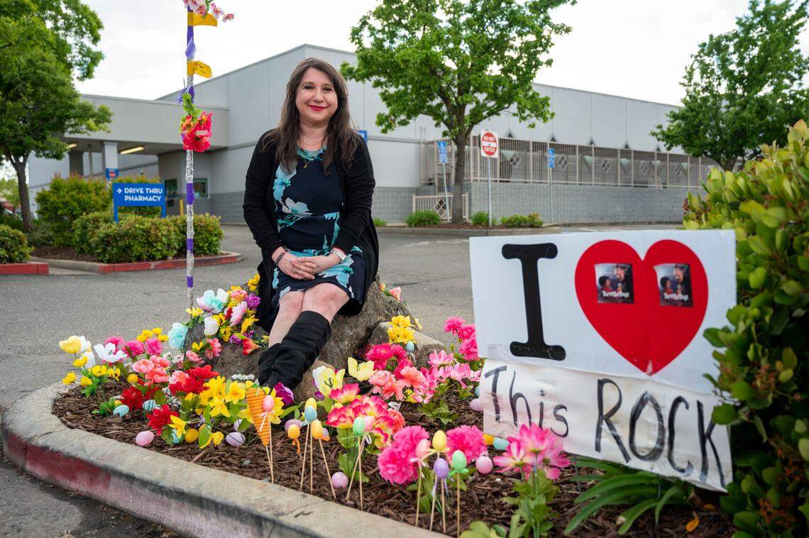 Natalie Macias sits on Rocky on April 16, after fans came out to decorate him for Spring. Rocky is a large rock located in a median in a Rite Aid parking lot in Antelope and is very prone to being hit by vehicles. So locals decided to bring more attention to Rocky with seasonal decorations. Macias started a Facebook group last year called “Antelope Rock” that now has 1,200 members.