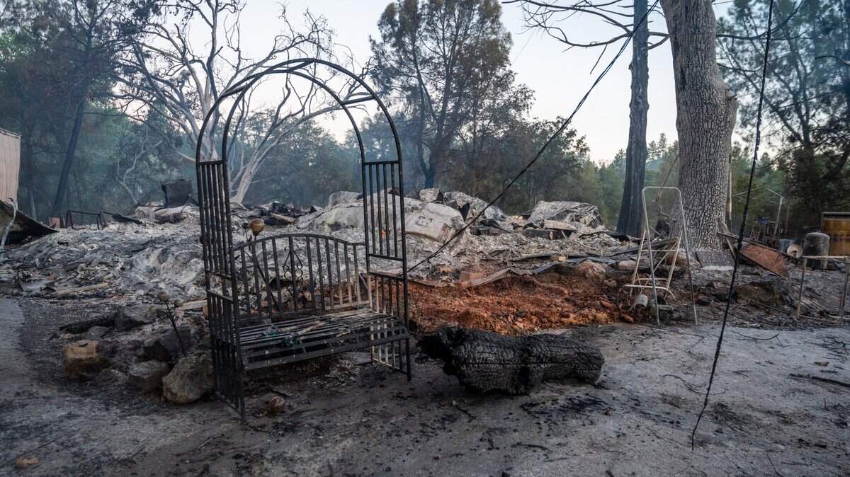 The rubble from a home lays on the ground during the River Fire on August 5. The River Fire is the latest fire to spread in Northern California. The Dixie Fire has continued to grow in size and multiple other fires are in the Shasta-Trinity National Forest and Klamath National Forest.