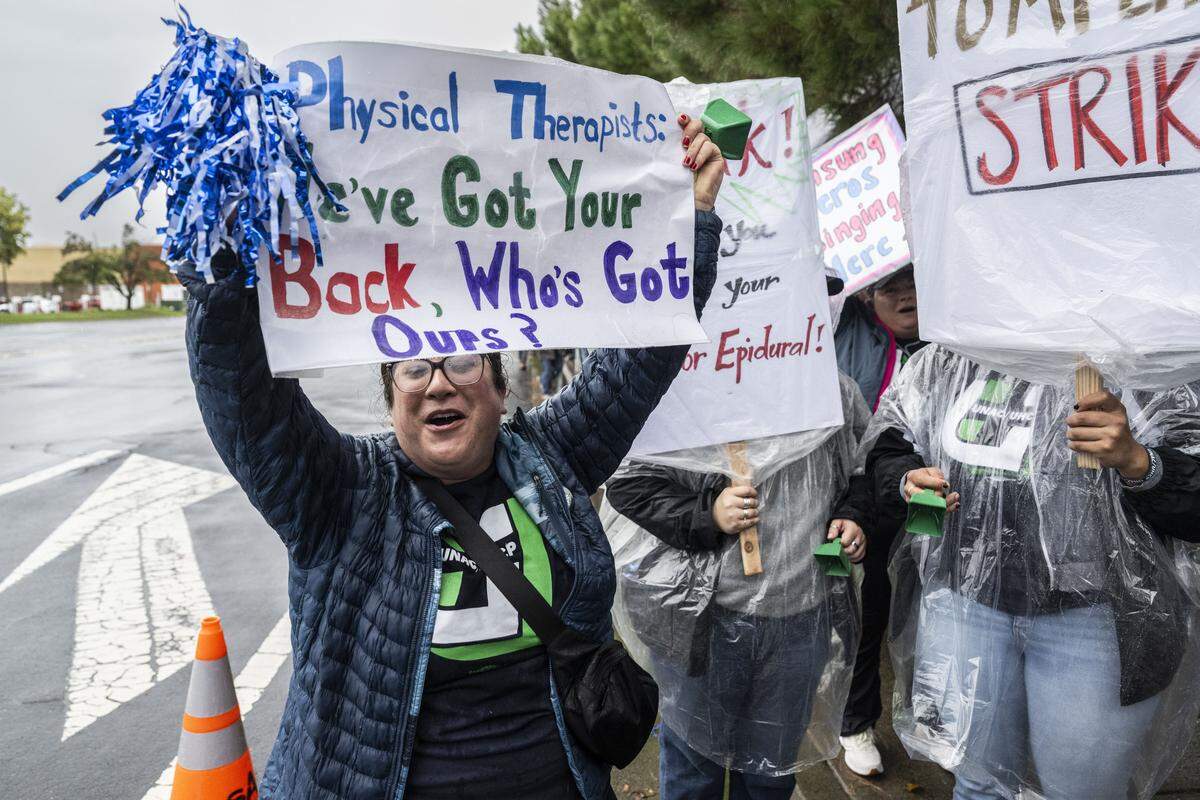 Kaiser Permanente worker Caitlin Galvez participates in a strike at the company's Roseville hospital on Tuesday.