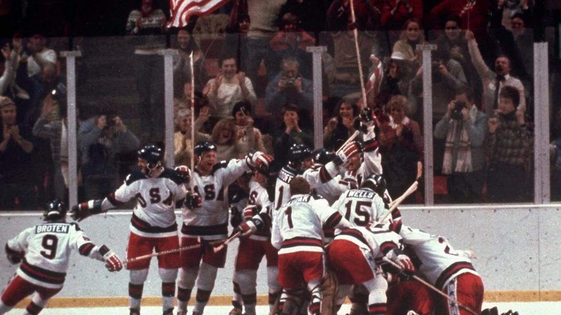 In this Feb. 22, 1980, file photo, the U.S. hockey team pounces on goalie Jim Craig after a 4-3 victory against the Soviet Union in a medal round match at the the 1980 Winter Olympics in Lake Placid, N.Y. The United States upset the mighty Soviets in a breathtaking moment freighted with the tension of the Cold War. After four decades, nobody is willing to stop talking about perhaps the greatest David over Goliath moment in the history of sports.