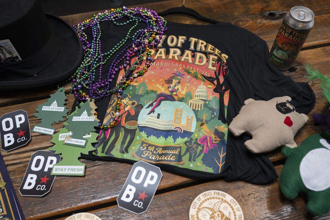 The City of Trees Parade beer, a collaboration between the parade’s organizers and Oak Park Brewing in Sacramento, and merchandise for the parade is displayed on Feb. 19.