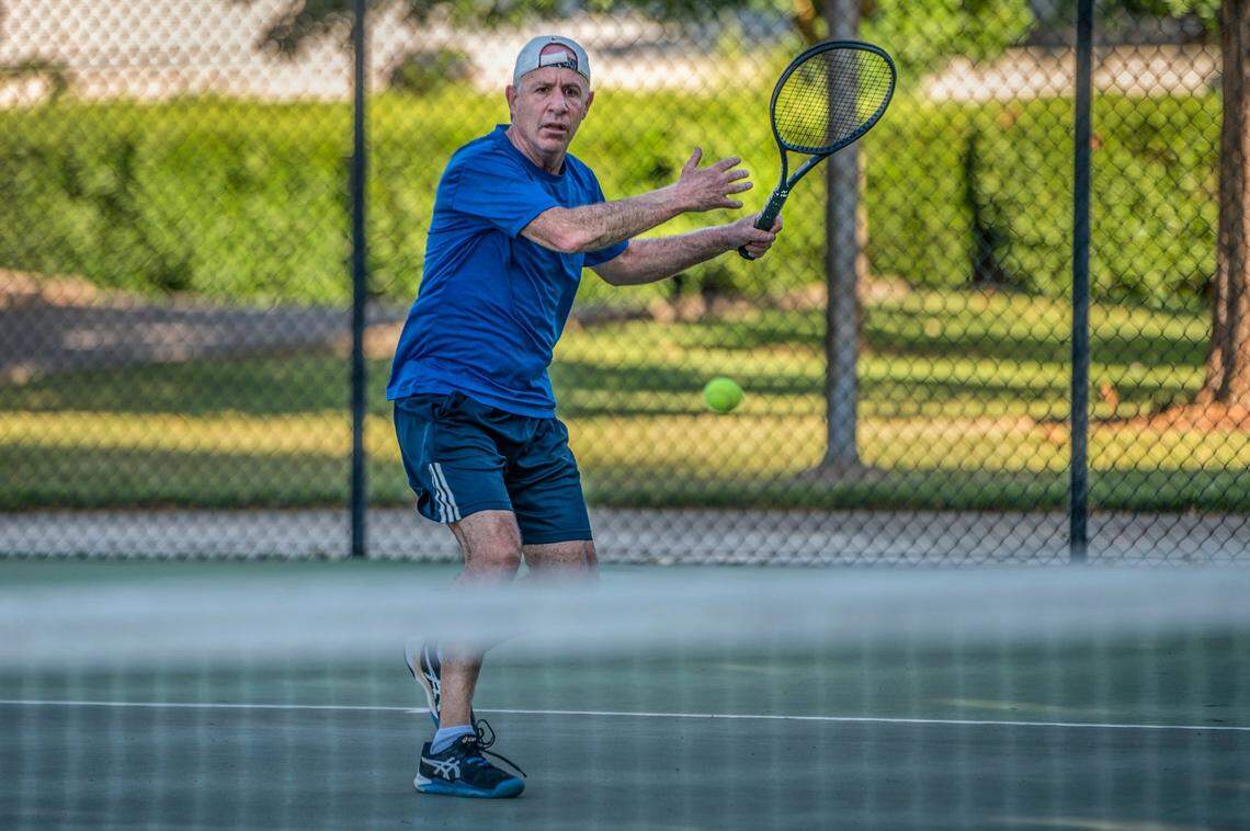 Darrell Steinberg plays tennis in May 2020, for the first time since the Garcia Bend Park courts were reopened to the public during the coronavirus outbreak. Departing the mayor’s office won’t mean retirement, he said.