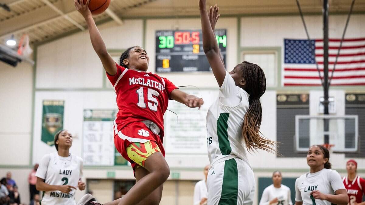 McClatchy Lions guard Tamaria Rumph (15), left, scores in January. Fourth-seeded McClatchy faces top-seeded Folsom in the semifinal on Tuesday.