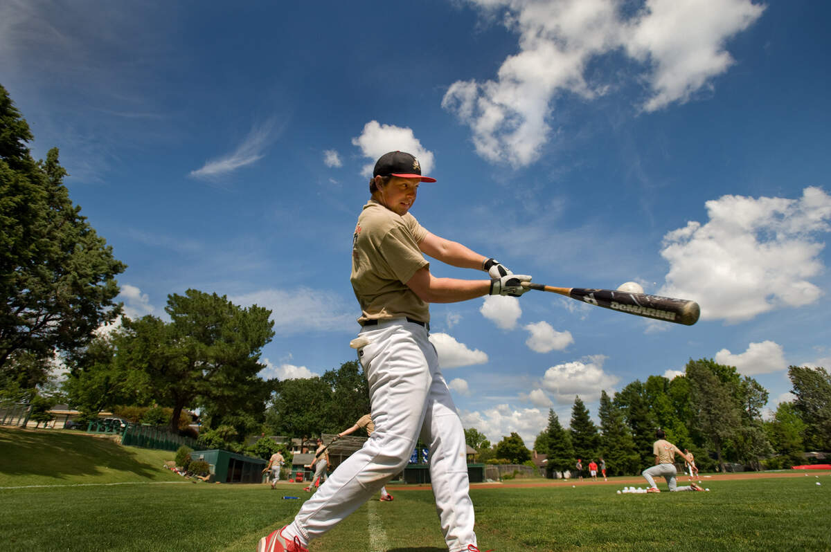 Jesuit High School slugger Rhys Hoskins hits a ball during practice at the school on Tuesday, May 17, 2010, as his team prepares to seek a three-peat in section baseball.