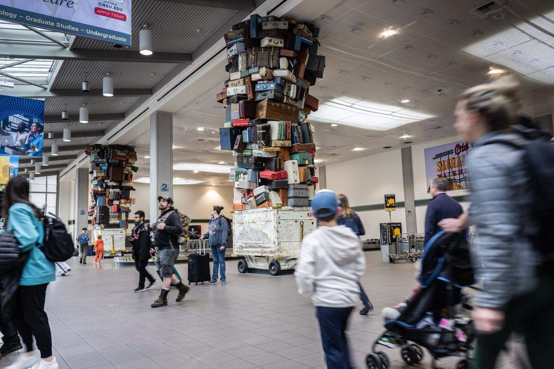 Travelers arrive at the Sacramento International Airport Terminal A on Tuesday, Nov. 26, 2024.