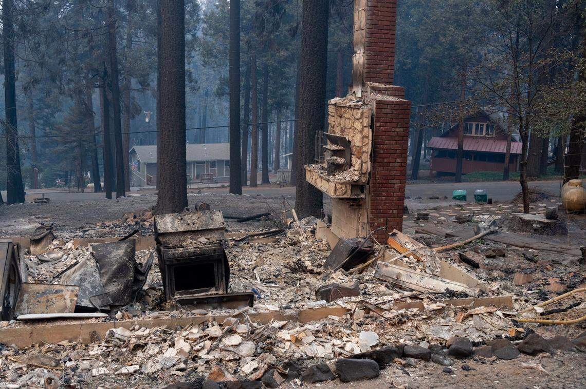 Across the street from the Freitas home, which can be seen at left in the background, the house of a neighbor who had moved in three weeks ago was destroyed in the Caldor Fire on Tuesday, Aug. 17, 2021 in Grizziy Flats.
