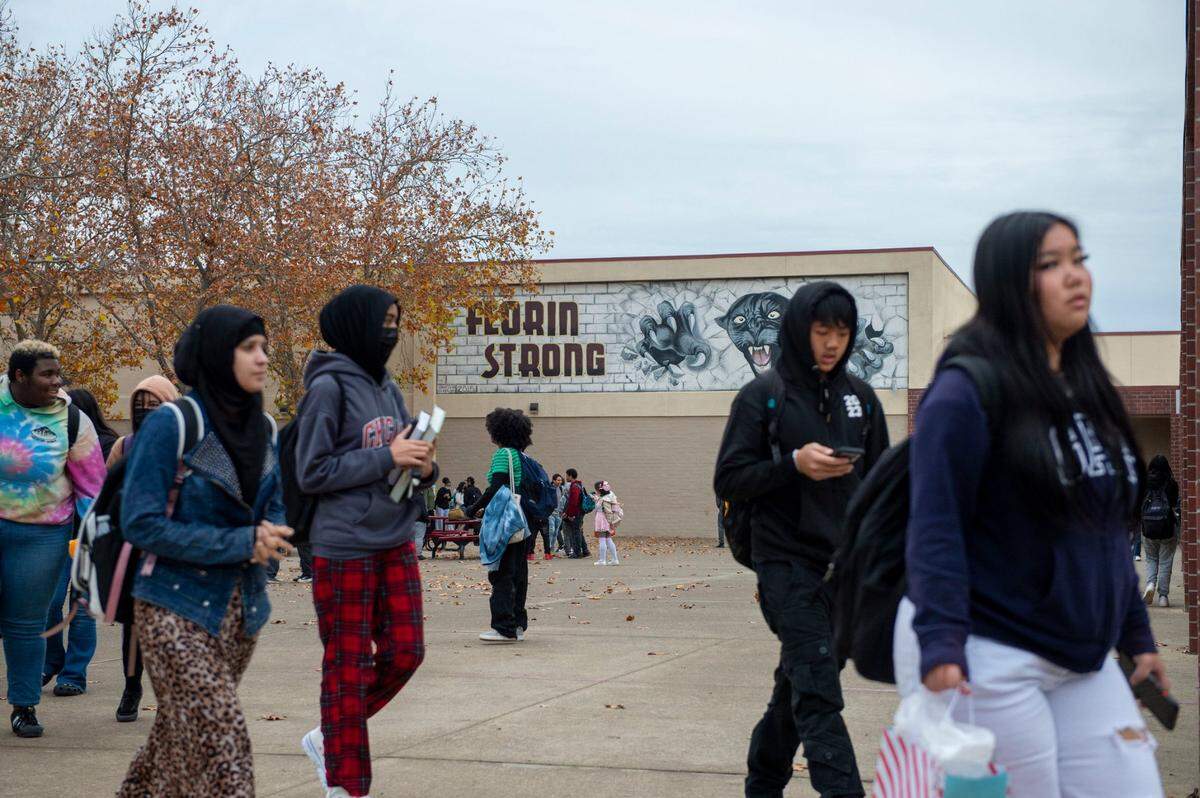 Students leave class at the end of the day at Florin High School on Thursday, Dec. 8, 2022.