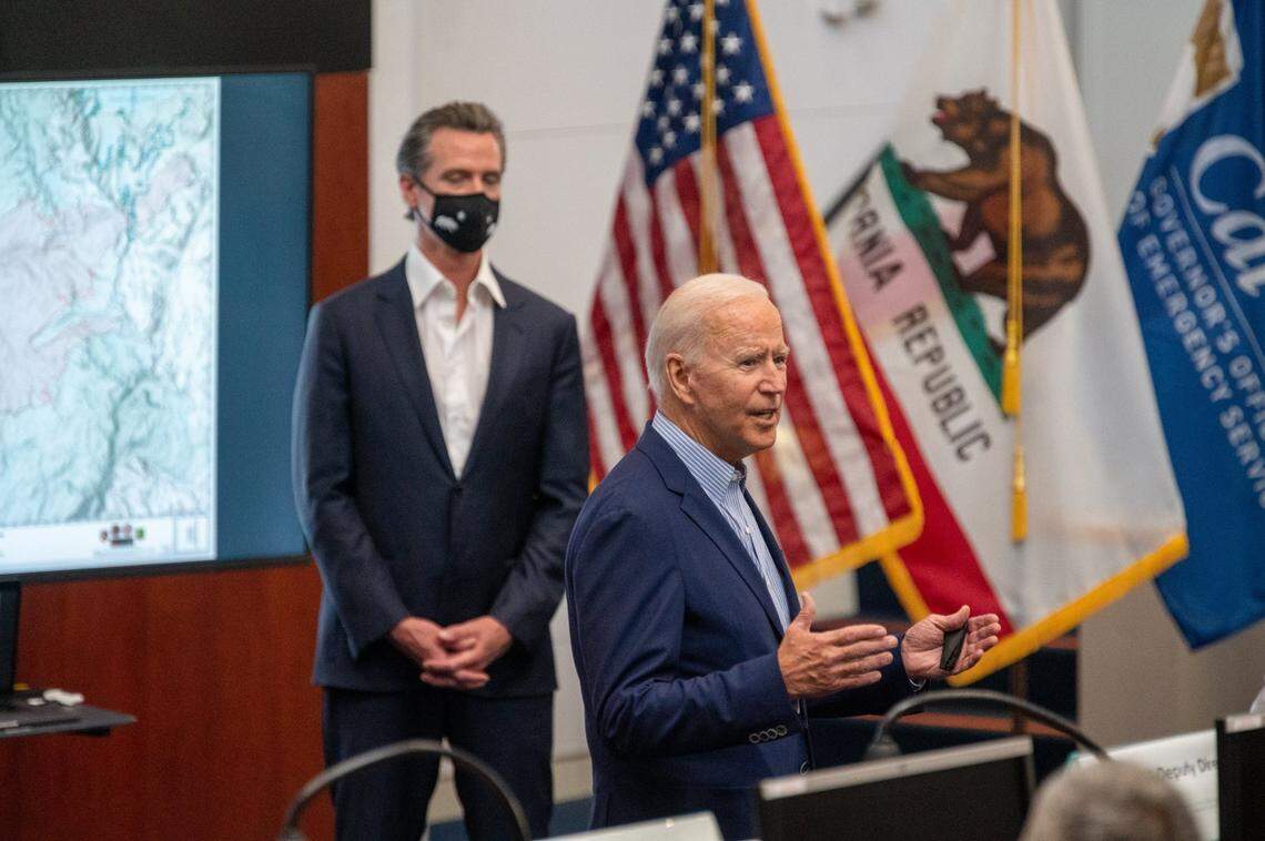 President Joe Biden, accompanied by Gov. Gavin Newsom, speaks during a briefing with emergency response personnel on the impacts of recent wildfires at the California Office of Emergency Services at Mather Airport on Monday, Sept. 13, 2021.