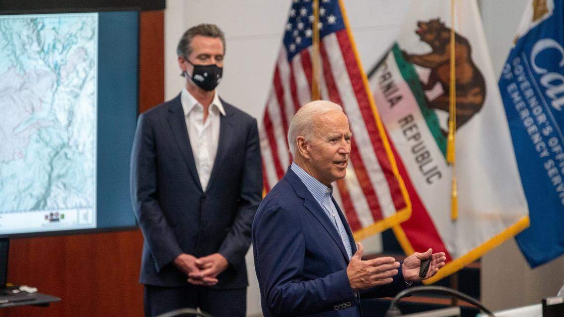 President Joe Biden, accompanied by Gov. Gavin Newsom, speaks during a briefing with emergency response personnel on the impacts of recent wildfires at the California Office of Emergency Services at Mather Airport on Monday.