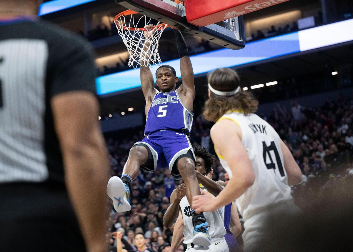 Sacramento Kings guard De’Aaron Fox (5) dunks late in a game against the Utah Jazz in December.