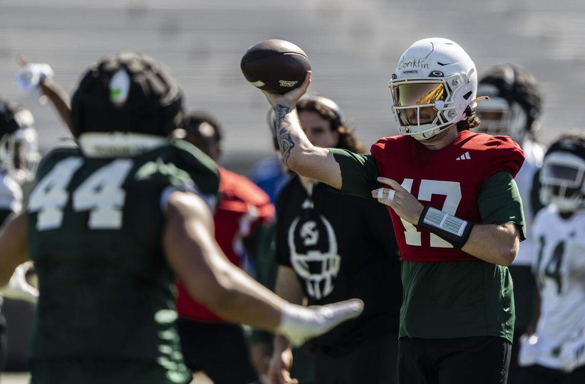 Sacramento State football quarterback Carson Conklin makes a pass during spring football drills on Thursday at Hornet Stadium.