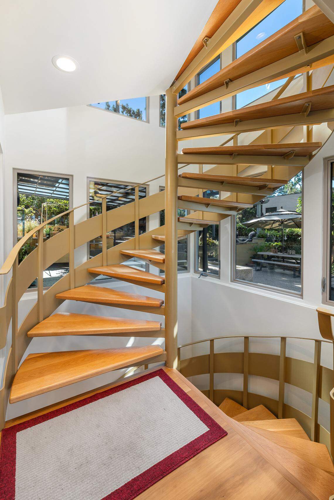 The Southern California mid-century modern has a floating staircase.