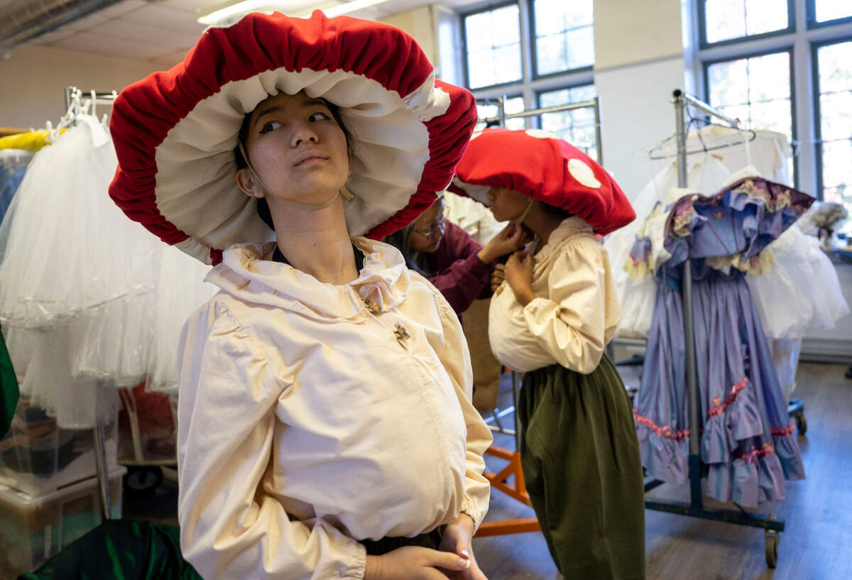 Maddie Toledo, 13, is fitted in a Mushroom costume for a day of cast photo shoots at the Sacramento Ballet studios earlier this month. 