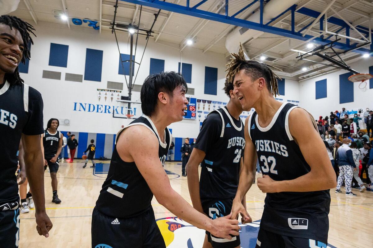 Sheldon Huskies’ Zomani Nigl (32), right, and Troy Crighton (2) celebrate their win over Inderkum after the overtime buzzer at the high school boys basketball Sac-Joaquin Section Division I semifinal playoff game Wednesday, Feb. 23, 2022, at Inderkum High School in Sacramento. Sheldon beat Inderkum 85-80 to advance to the title game.