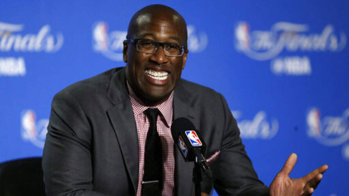 FILE - In this June 1, 2017, file photo, Golden State Warriors interim head coach Mike Brown answers questions during a news conference after Game 1 of basketball’s NBA Finals against the Cleveland Cavaliers in Oakland, Calif. Brown has a do-for-others nature and as the Warriors host Cleveland on Christmas Day everyone will remember exactly what he did to help guide Golden State to a second title in three years last June as he filled in for ailing head coach Steve Kerr. (AP Photo/Ben Margot, File)