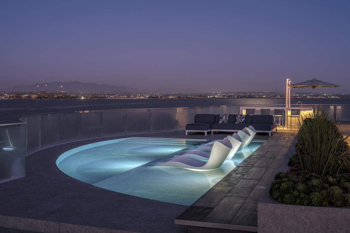 Newly constructed in 2021, the residence features a contemporary linear design and a three-story layout.