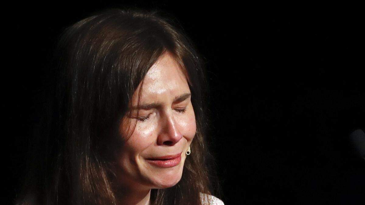 Amanda Knox gets emotional as she speaks at a Criminal Justice Festival at the University of Modena, Italy, in June. Now Knox and her fiance are seeking financial help to pay for their upcoming wedding.