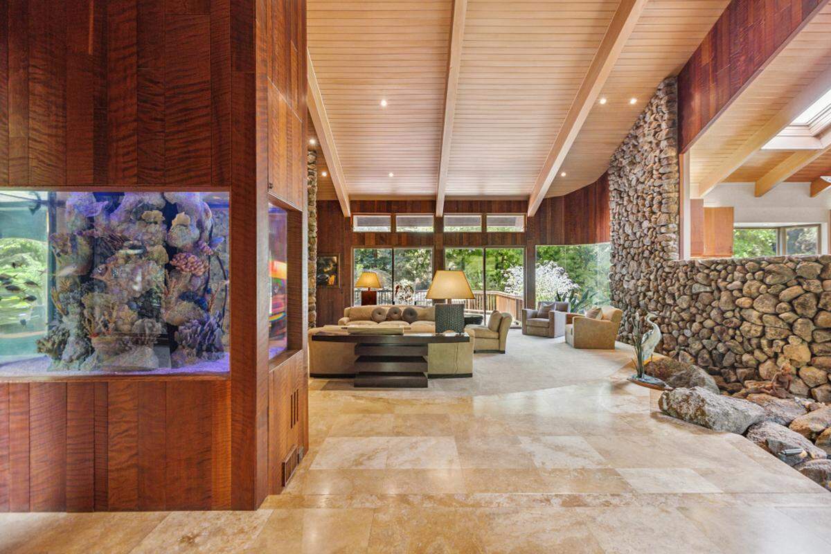 The main home spans over 9,000 square feet with five bedrooms and six bathrooms.