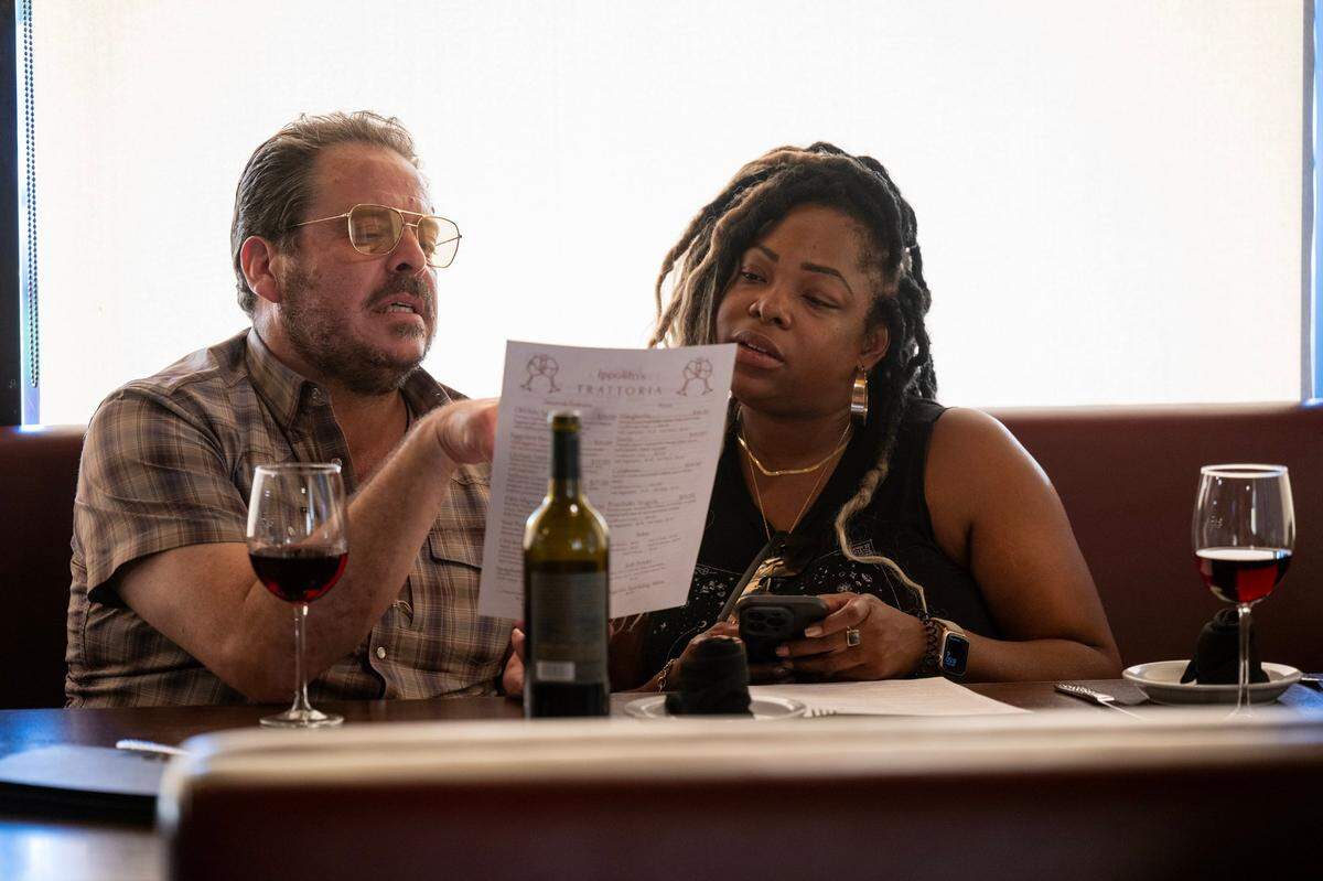 Danielle Odem and Jake Lustig view the menu at Ippolito’s Trattoria earlier this month. The restaurant was voted the region’s most underrated Italian restaurant by Bee readers.